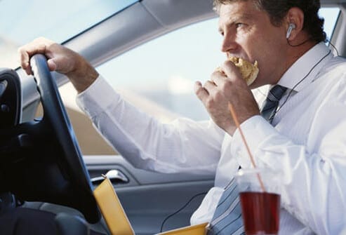 heartburn s3 man eating in car
