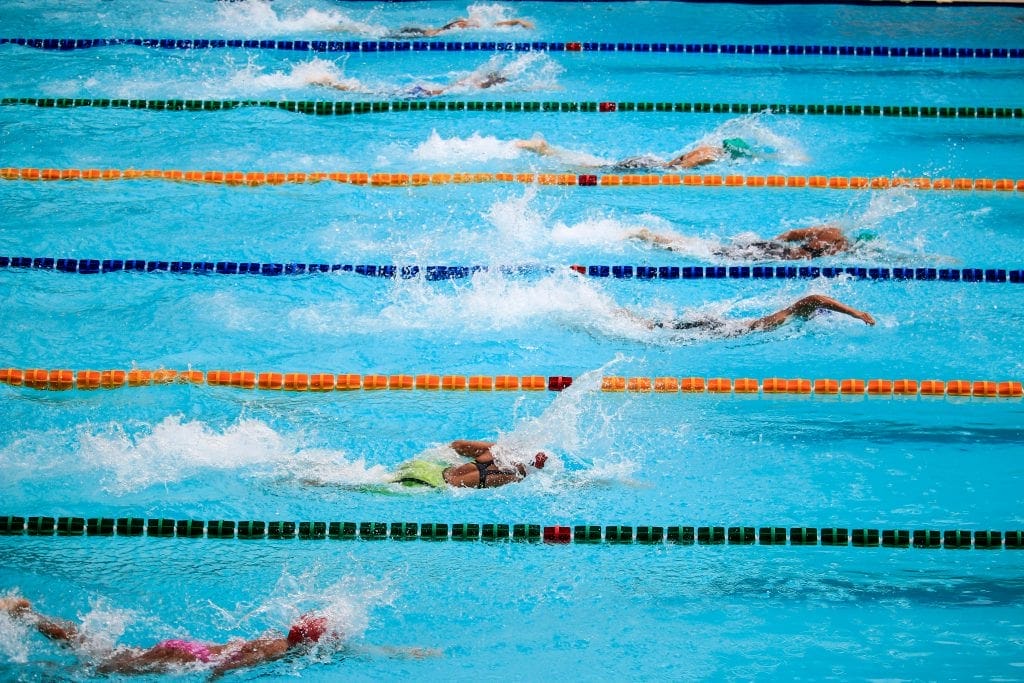 Canva People Doing Swim Race